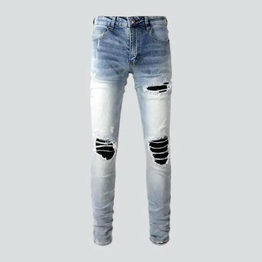 Black-patch whiskered jeans